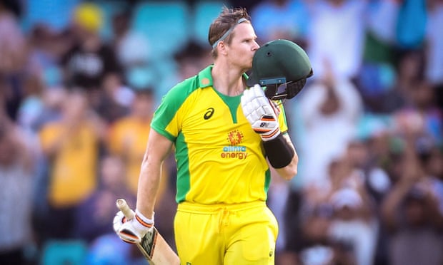 Steve Smith celebrates reaching his century in Australia’s comfortable win over India in the first ODI at the SCG. Photograph: David Gray/AFP/Getty Images