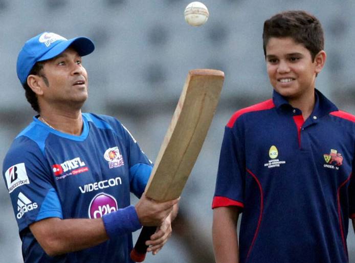 Sachin Tendulkar, with Arjun Tendulkar who is a left handed batsman unlike his father (PTI photo)
