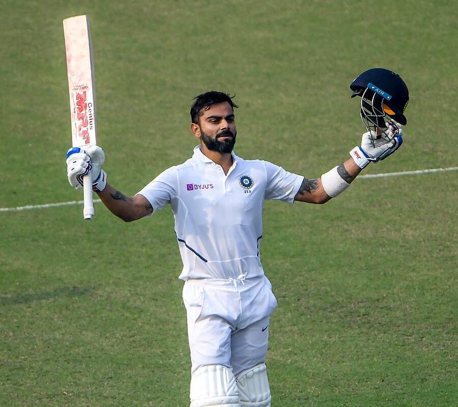 India's captain Virat Kohli celebrates his century (100 runs) during the second day of the second Test cricket match of a two-match series between India and Bangladesh at the Eden Gardens cricket stadium in Kolkata on November 23, 2019. 