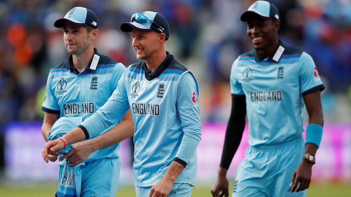 England's Joe Root celebrates with team mates Chris Woakes and Jofra Archer. Action Images via Reuters