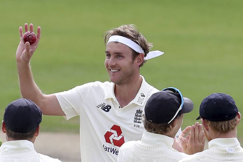 England's Stuart Broad holds the ball to celebrate taking 500 wickets Martin Rickett/Pool via AP
