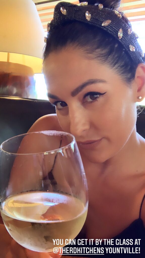 WWE Star Nikki Bella Promotes Wine Brand In Revealing Outfit 6