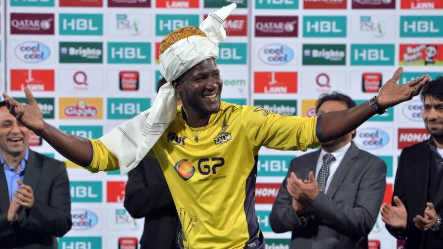 Darren Sammy goes traditional after Peshawar Zalmi's PSL title win in 2017 AFP via Getty Images