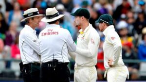 Cameron Bancroft and Steve Smith with the two umpires [Image-Getty]