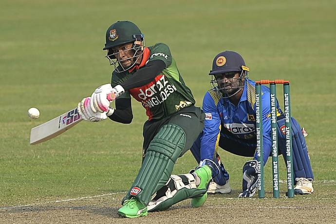 Mushfiqur Rahim plays a shot. - AFP