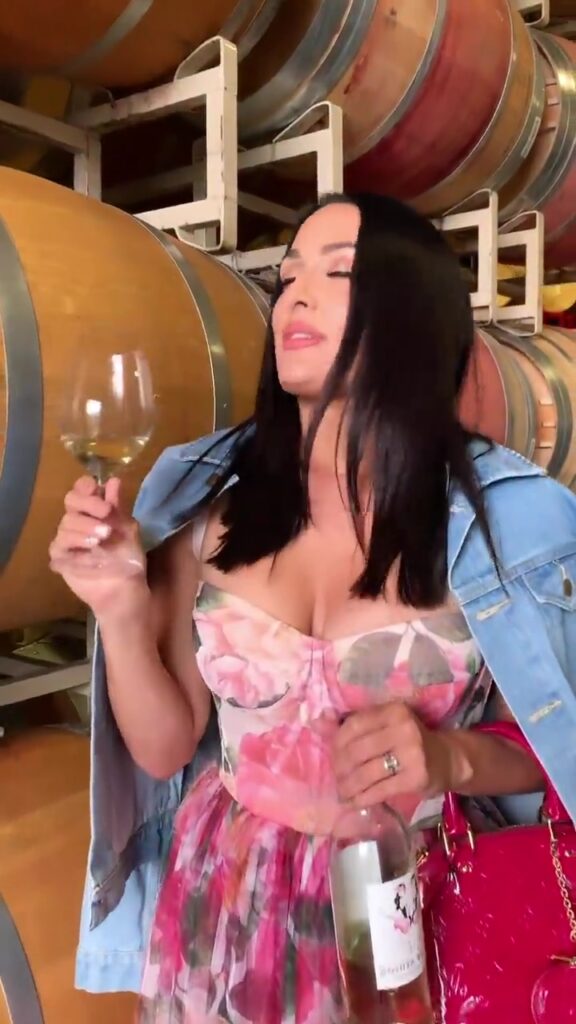 WWE Star Nikki Bella Celebrates Wine Bottling Day In Gorgeous Floral Dress 2