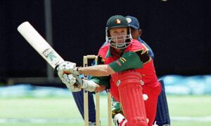 Zimbabwe captain Andy Flower prepares to reverse sweep ©Reuters