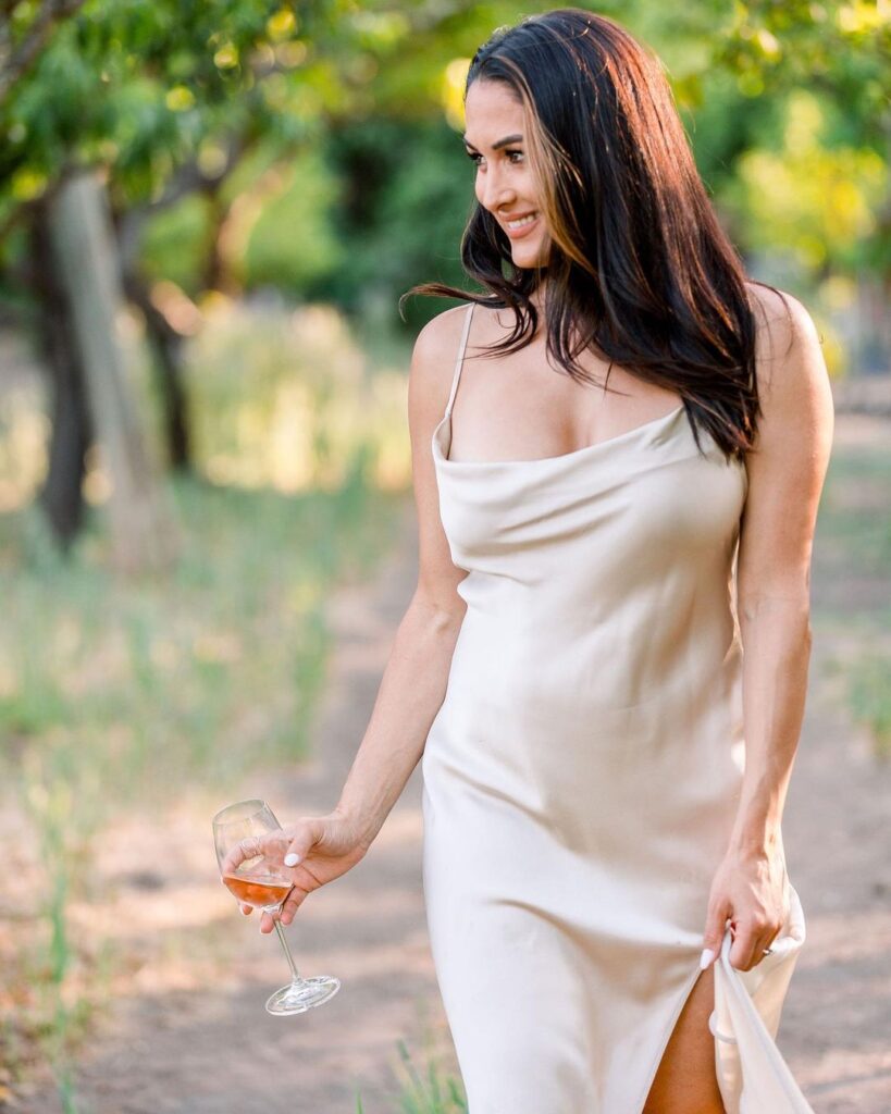 Nikki Bella Poses As White Wine Lover In Stunning Photos Ahead Of WWE Collaboration 1