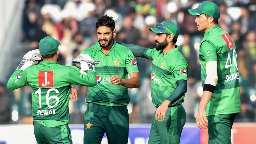 Haris Rauf celebrates a wicket with his team-mates AFP via Getty Images