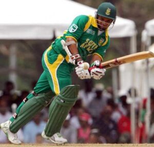 Ashwell Prince squeezes a run off Danish Kaneria © AFP