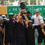 South Africa's Dean Elgar celebrates with teammates and the trophy after winning the match and the series, Third Test - South Africa v India - Newlands Cricket Ground, Cape Town, South Africa - January 14, 2022 | Photo Credit: Reuters