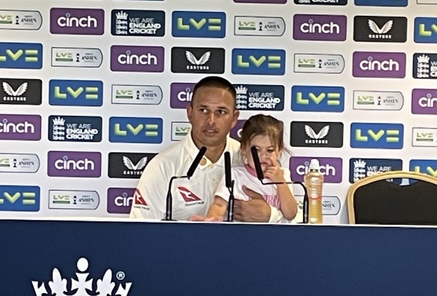 Usman Khawaja with his daughter