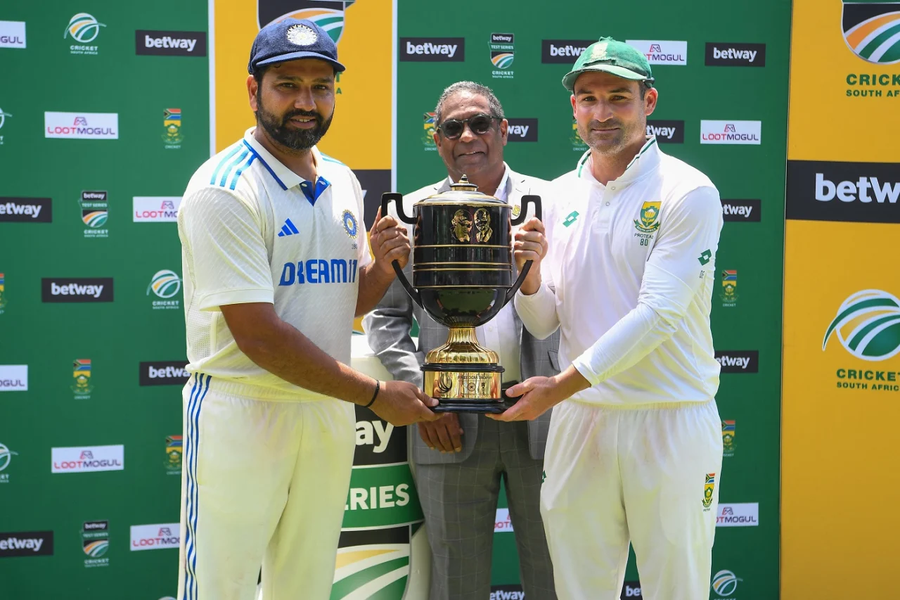 Rohit Sharma And Dean Elgar Pose With Trophy