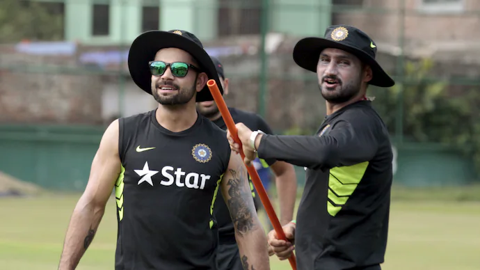 Harbhajan Singh and Virat Kohli. Photo- BCCI