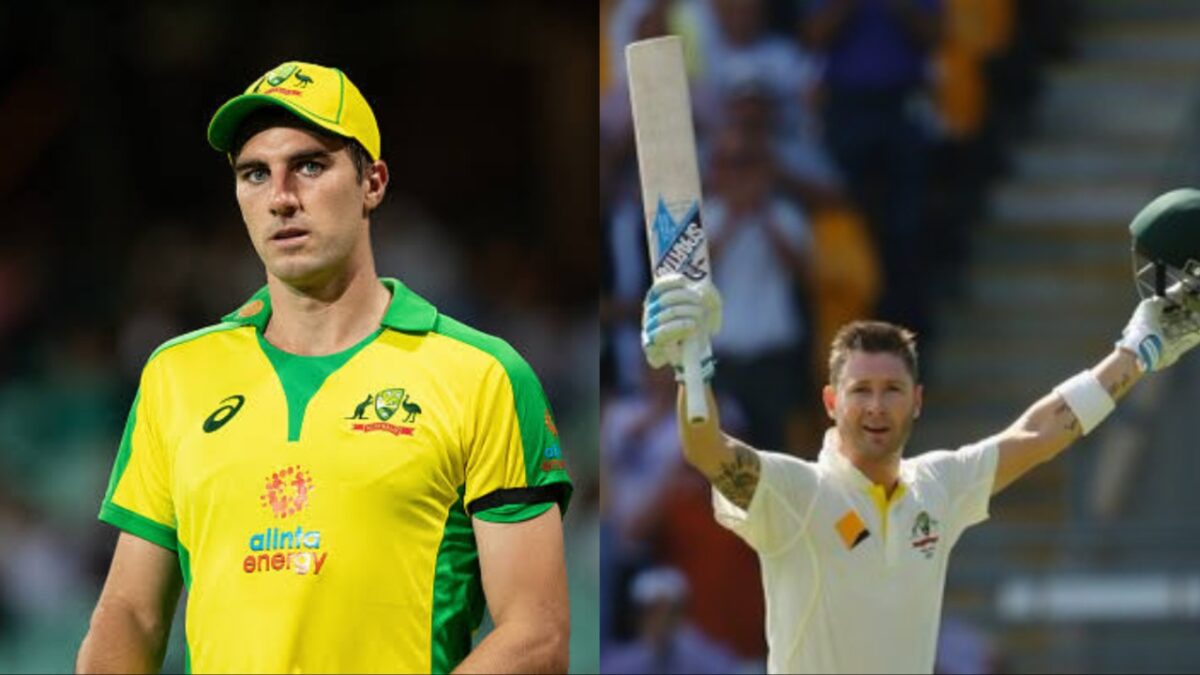 Pat Cummins and Michael Clarke of Australia.