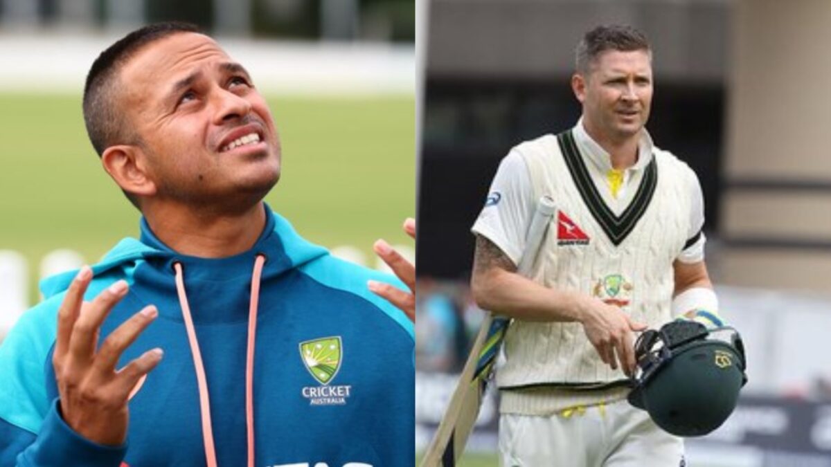 Usman Khawaja and Michael Clarke of Australia.